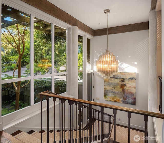 107 NW Highland Dr, Seattle, WA 98177 - unfurnished sunroom featuring a chandelier