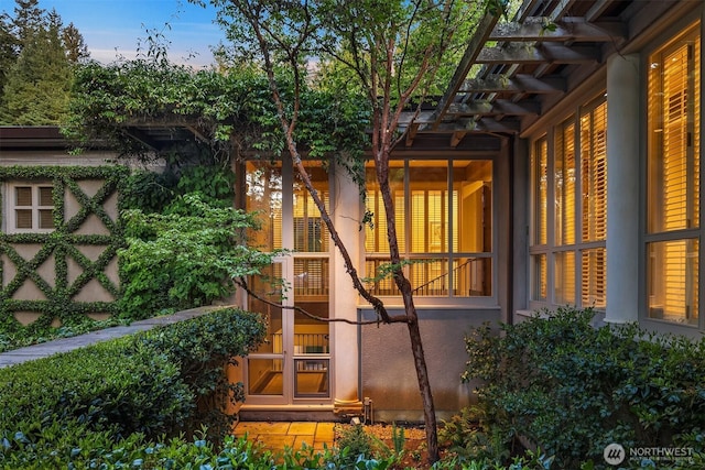 107 NW Highland Dr, Seattle, WA 98177 - view of home's exterior with stucco siding and french doors