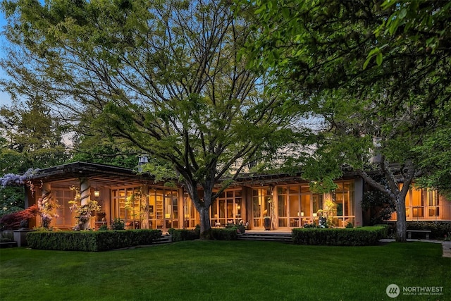 107 NW Highland Dr, Seattle, WA 98177 - back of house featuring a lawn