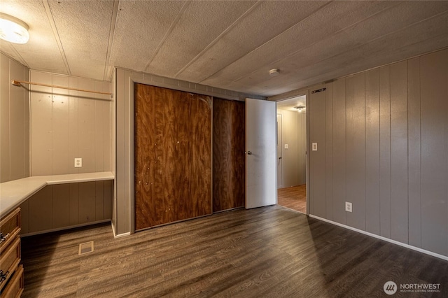 211 Pace Dr Unit 16, East Wenatchee, WA 98802 - unfurnished bedroom with wood finished floors and a closet