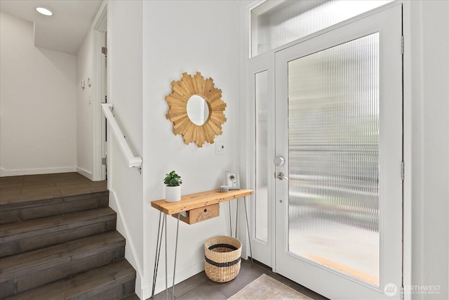 entryway featuring stairs, baseboards, and recessed lighting