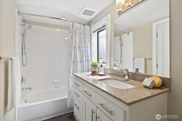 full bathroom with vanity and shower / bath combo with shower curtain