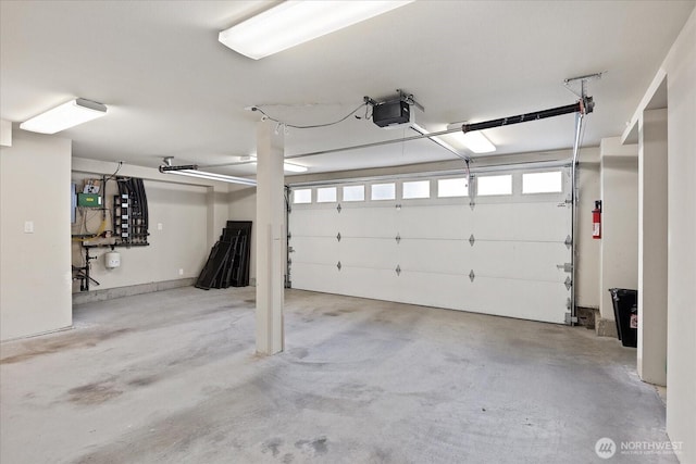garage featuring a garage door opener