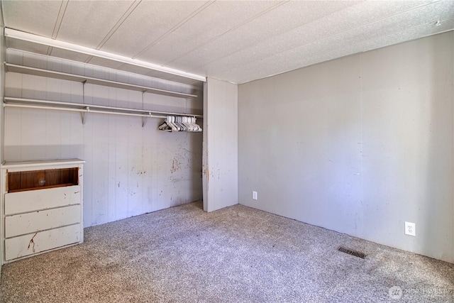unfurnished bedroom featuring carpet flooring