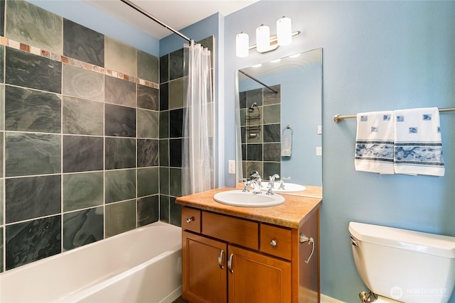 bathroom with shower / bath combo with shower curtain, toilet, and vanity