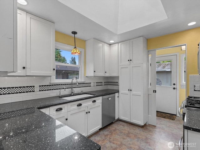 kitchen with a sink, dishwasher, white cabinets, healthy amount of natural light, and recessed lighting