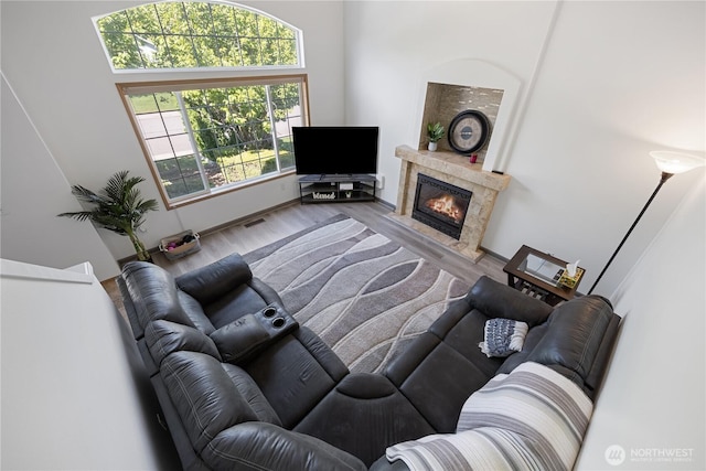 2983 Sonoran Dr, Richland, WA 99354 - living area with visible vents, wood finished floors, and a high end fireplace