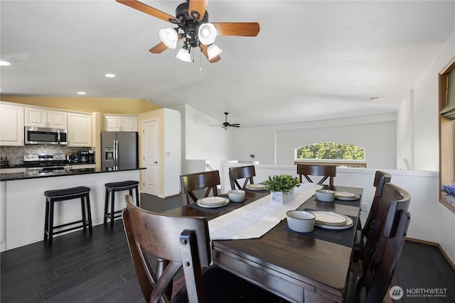 2983 Sonoran Dr, Richland, WA 99354 - dining space featuring dark wood finished floors, lofted ceiling, a ceiling fan, and recessed lighting