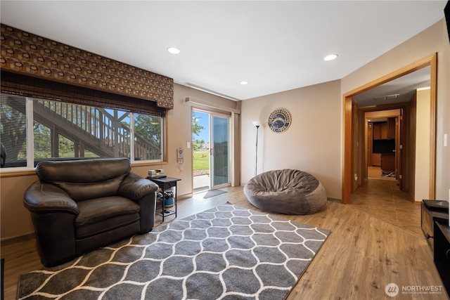 2983 Sonoran Dr, Richland, WA 99354 - living room with recessed lighting, baseboards, and wood finished floors