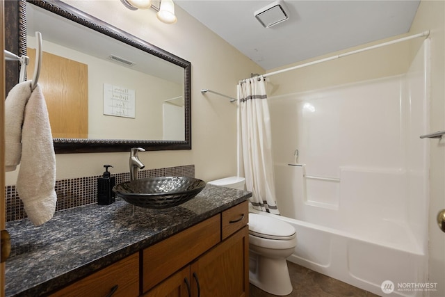 2983 Sonoran Dr, Richland, WA 99354 - full bath with shower / bath combination with curtain, toilet, visible vents, and vanity