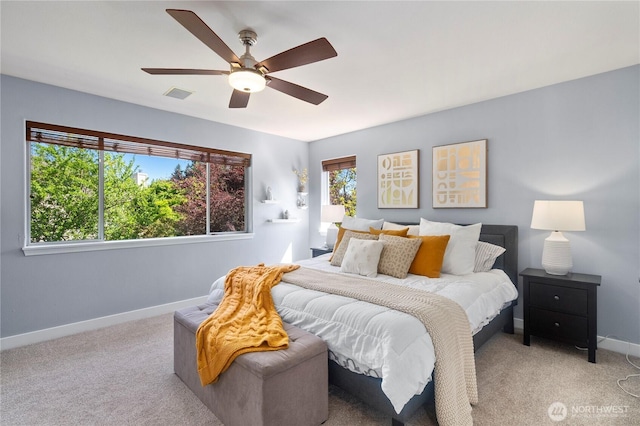 bedroom featuring baseboards, carpet, and a ceiling fan