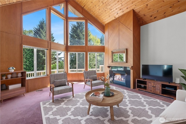 5127 215th St SE, Woodinville, WA 98072 - living area with plenty of natural light, carpet flooring, high vaulted ceiling, wood ceiling, and a fireplace