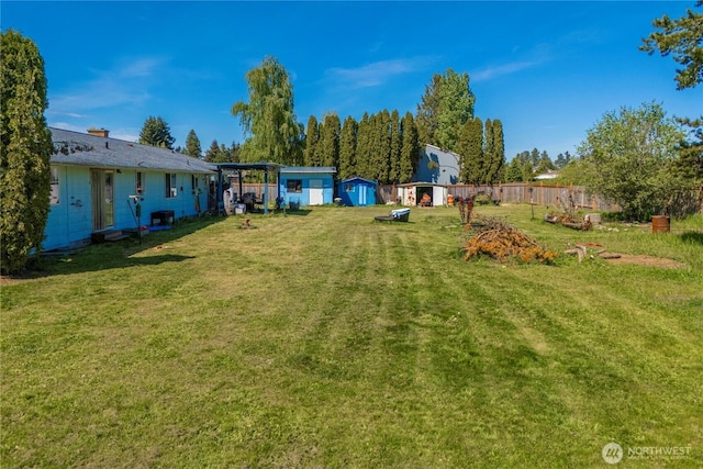 18246 Cinnamon Ln SW, Rochester, WA 98579 - view of yard featuring a storage shed and an outbuilding