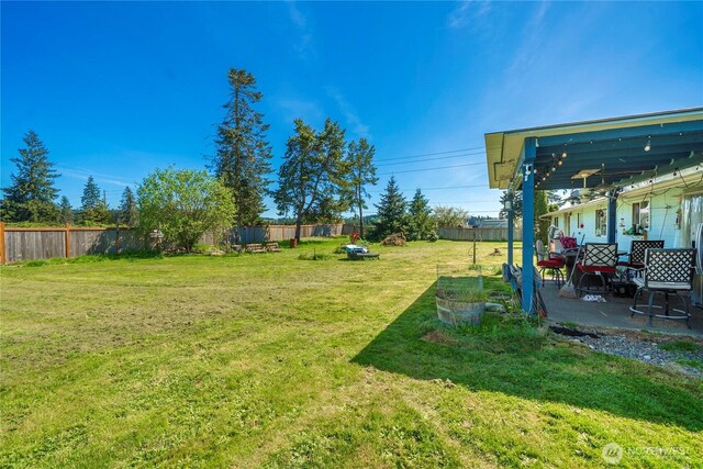 18246 Cinnamon Ln SW, Rochester, WA 98579 - view of yard with a patio