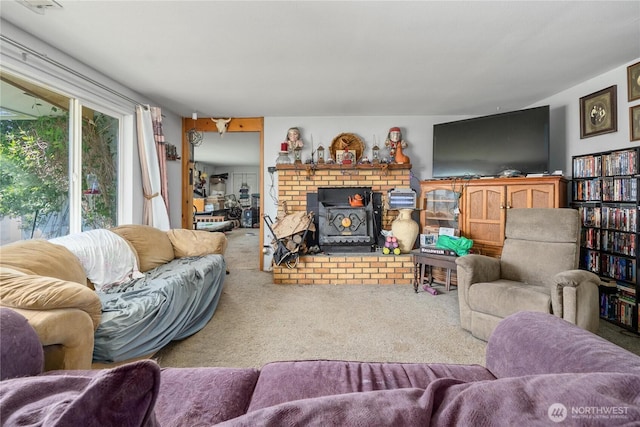 18246 Cinnamon Ln SW, Rochester, WA 98579 - carpeted living room featuring a wood stove