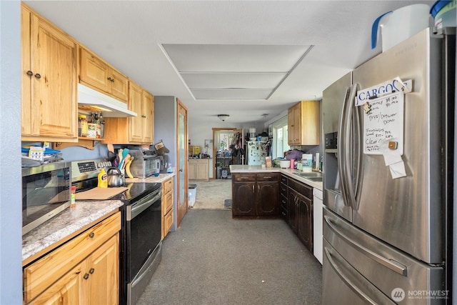18246 Cinnamon Ln SW, Rochester, WA 98579 - kitchen with stainless steel appliances, under cabinet range hood, light countertops, and dark colored carpet