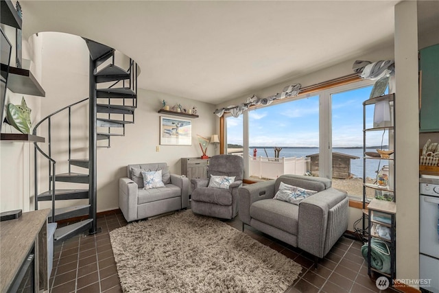 3312 SW 172nd St, Burien, WA 98166 - living area with a water view, stairway, and dark tile patterned floors