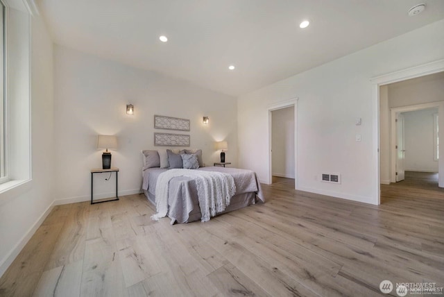 39195 Blackmouth Pl NE, Hansville, WA 98340 - bedroom featuring light wood-style floors, baseboards, and recessed lighting