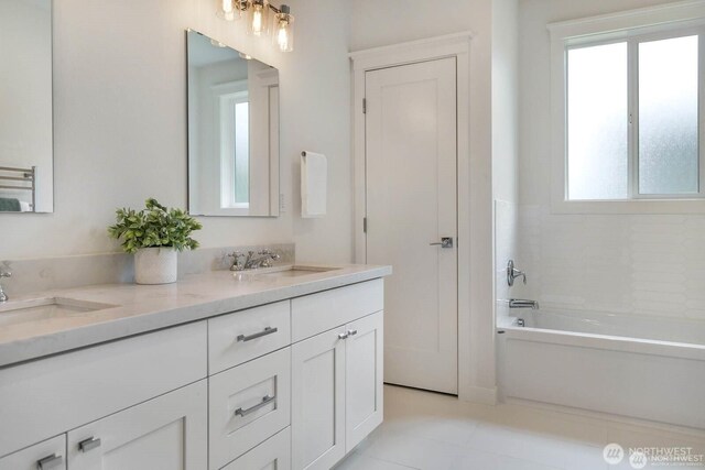 39195 Blackmouth Pl NE, Hansville, WA 98340 - bathroom featuring double vanity and tile patterned flooring