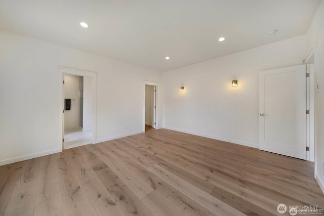 39195 Blackmouth Pl NE, Hansville, WA 98340 - spare room featuring light wood-style flooring, recessed lighting, and baseboards