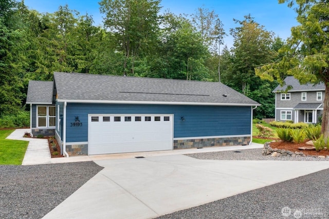 39195 Blackmouth Pl NE, Hansville, WA 98340 - garage featuring driveway