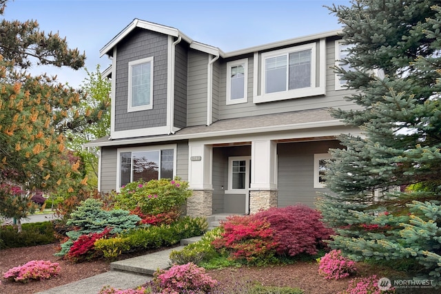 4763 Arbors Cir, Mukilteo, WA 98275 - view of front of property with stone siding and a porch