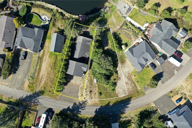 aerial view of residential area with property boundaries highlighted