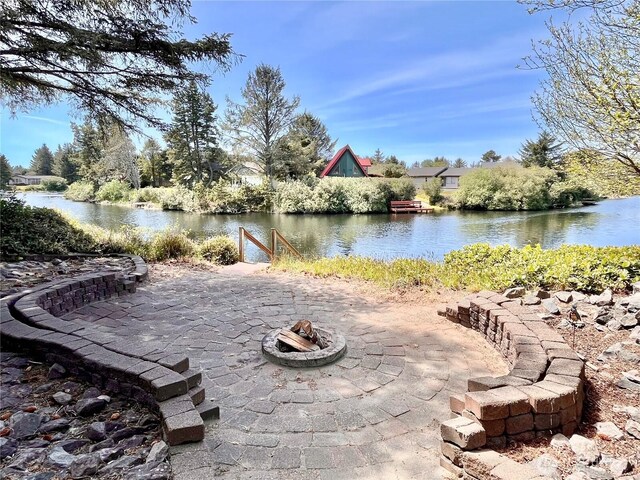 water view featuring a fire pit