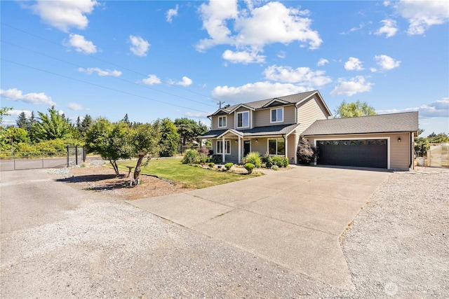 3612 64th St E, Tacoma, WA 98443 - traditional home with driveway, an attached garage, and covered porch
