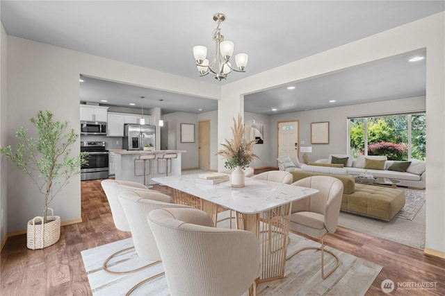 3612 64th St E, Tacoma, WA 98443 - dining space featuring light wood-style floors, a chandelier, and recessed lighting