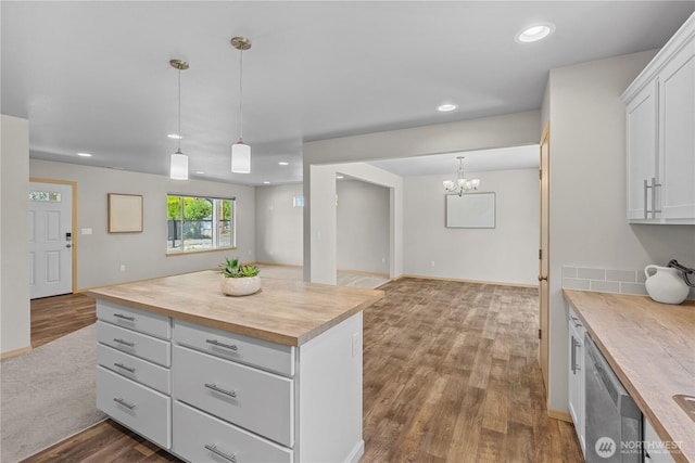 3612 64th St E, Tacoma, WA 98443 - kitchen with butcher block countertops, dishwasher, dark wood-style floors, white cabinets, and recessed lighting