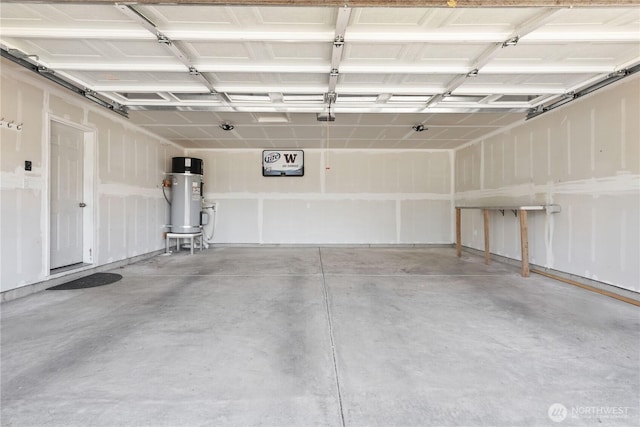 3612 64th St E, Tacoma, WA 98443 - garage featuring hybrid water heater and a garage door opener