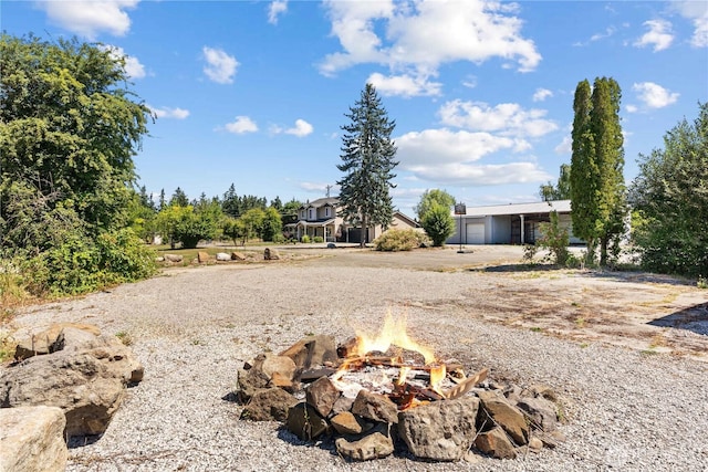 3612 64th St E, Tacoma, WA 98443 - view of yard with an outdoor fire pit and an attached garage
