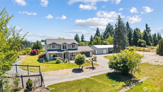 3612 64th St E, Tacoma, WA 98443 - traditional home featuring driveway and a garage
