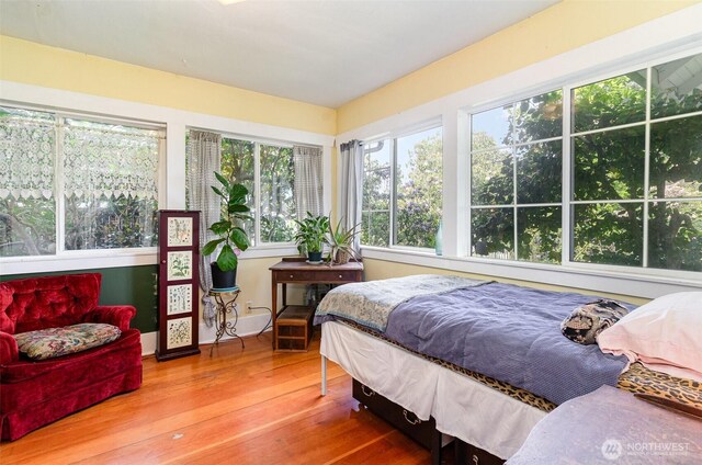 bedroom featuring wood finished floors
