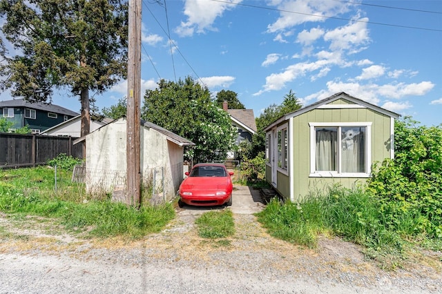 view of car parking with fence