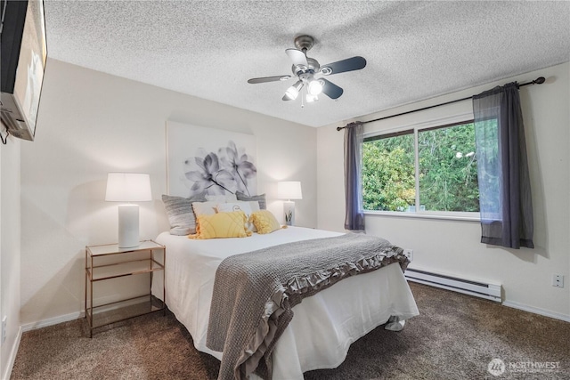 bedroom with a baseboard heating unit, carpet floors, baseboards, a ceiling fan, and a textured ceiling