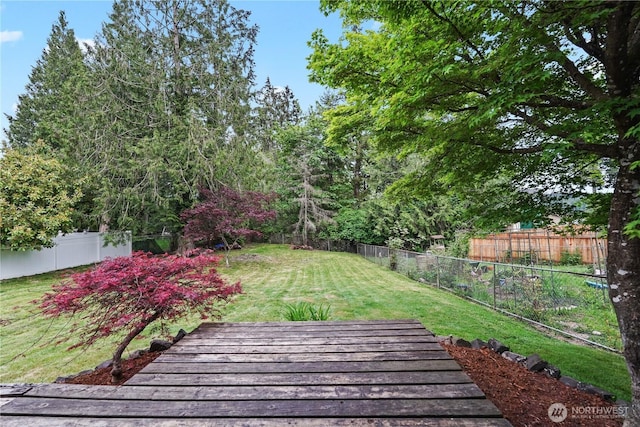 view of yard with a wooden deck