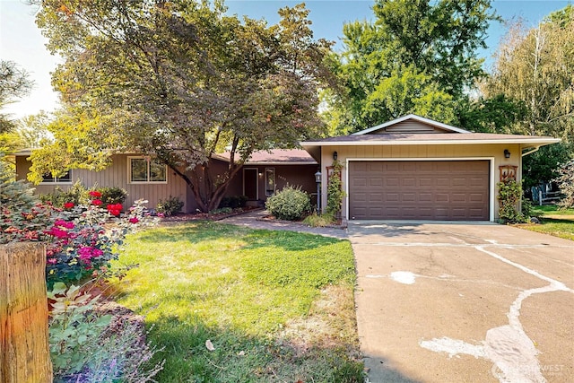 2022 Scarpelli Dr, Walla Walla, WA 99362 - ranch-style home with concrete driveway, a front lawn, and an attached garage
