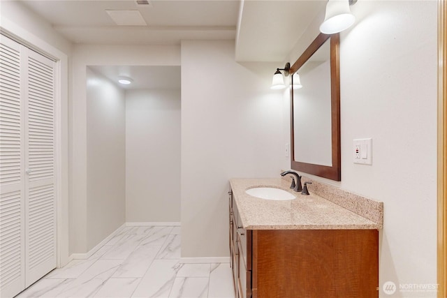 2022 Scarpelli Dr, Walla Walla, WA 99362 - bathroom with marble look tiles, vanity, and baseboards