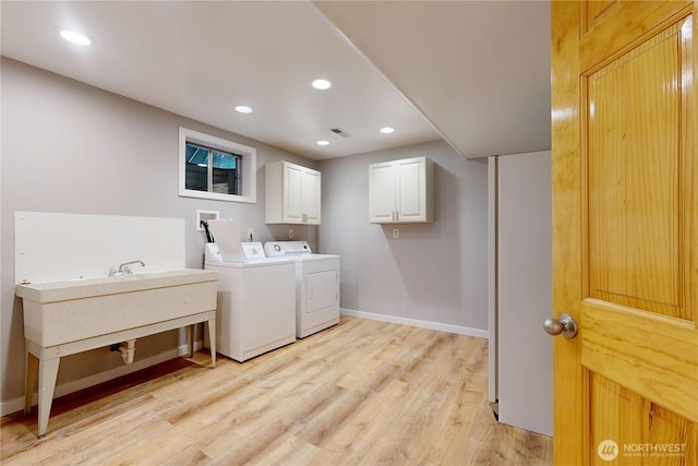 2022 Scarpelli Dr, Walla Walla, WA 99362 - clothes washing area featuring cabinet space, independent washer and dryer, light wood-style floors, baseboards, and recessed lighting