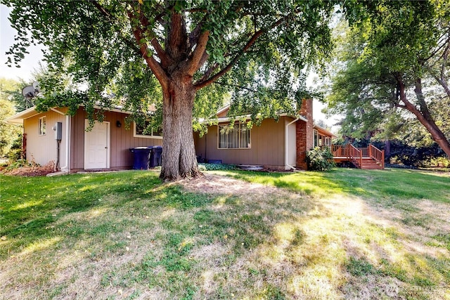 2022 Scarpelli Dr, Walla Walla, WA 99362 - rear view of property with a chimney, a yard, and a deck