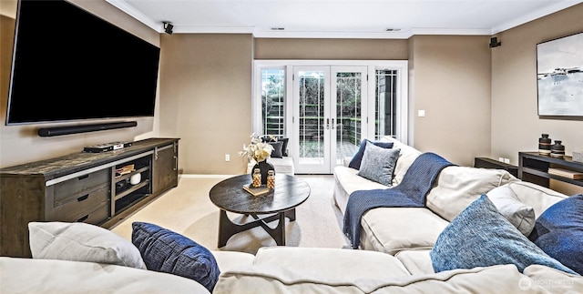 living area featuring carpet flooring, french doors, baseboards, and ornamental molding