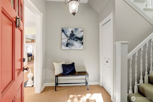 1109 30th Ave, Seattle, WA 98122 - foyer entrance featuring light carpet, baseboards, and stairs