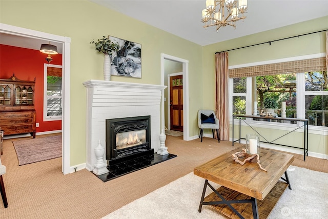1109 30th Ave, Seattle, WA 98122 - carpeted living room with a brick fireplace, a chandelier, and baseboards