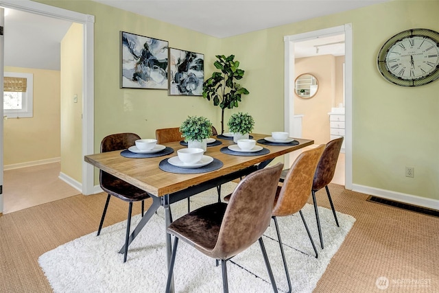 1109 30th Ave, Seattle, WA 98122 - dining room featuring light carpet and baseboards
