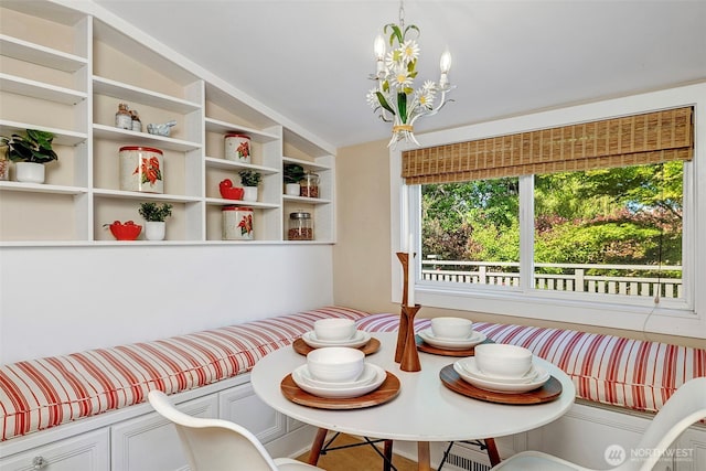 1109 30th Ave, Seattle, WA 98122 - dining space with breakfast area, vaulted ceiling, and a chandelier