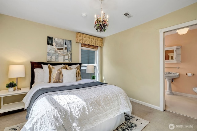 1109 30th Ave, Seattle, WA 98122 - carpeted bedroom featuring a chandelier and baseboards