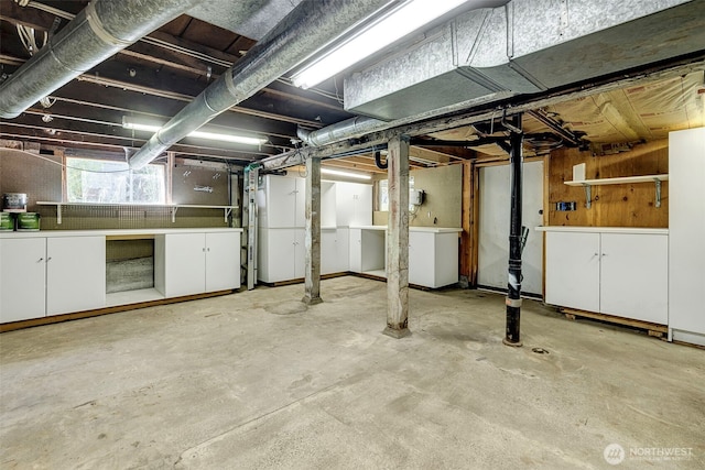 1109 30th Ave, Seattle, WA 98122 - basement featuring refrigerator