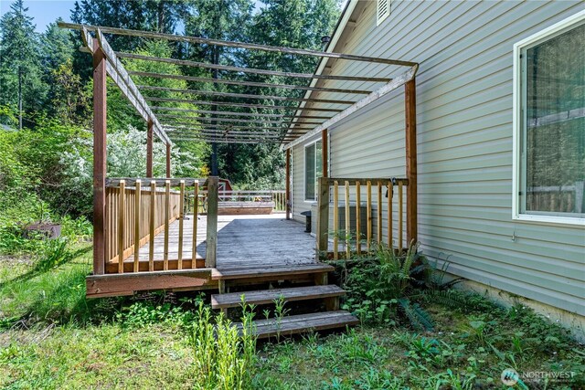 wooden deck with a pergola